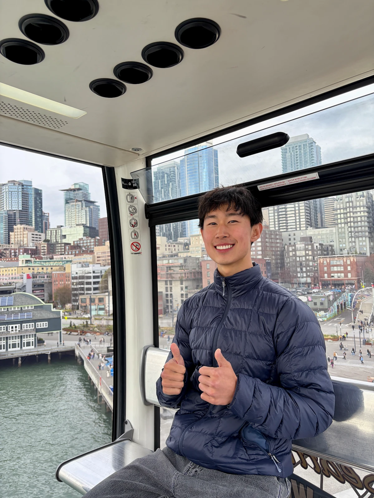 John Kim in front of the Seattle waterfront.